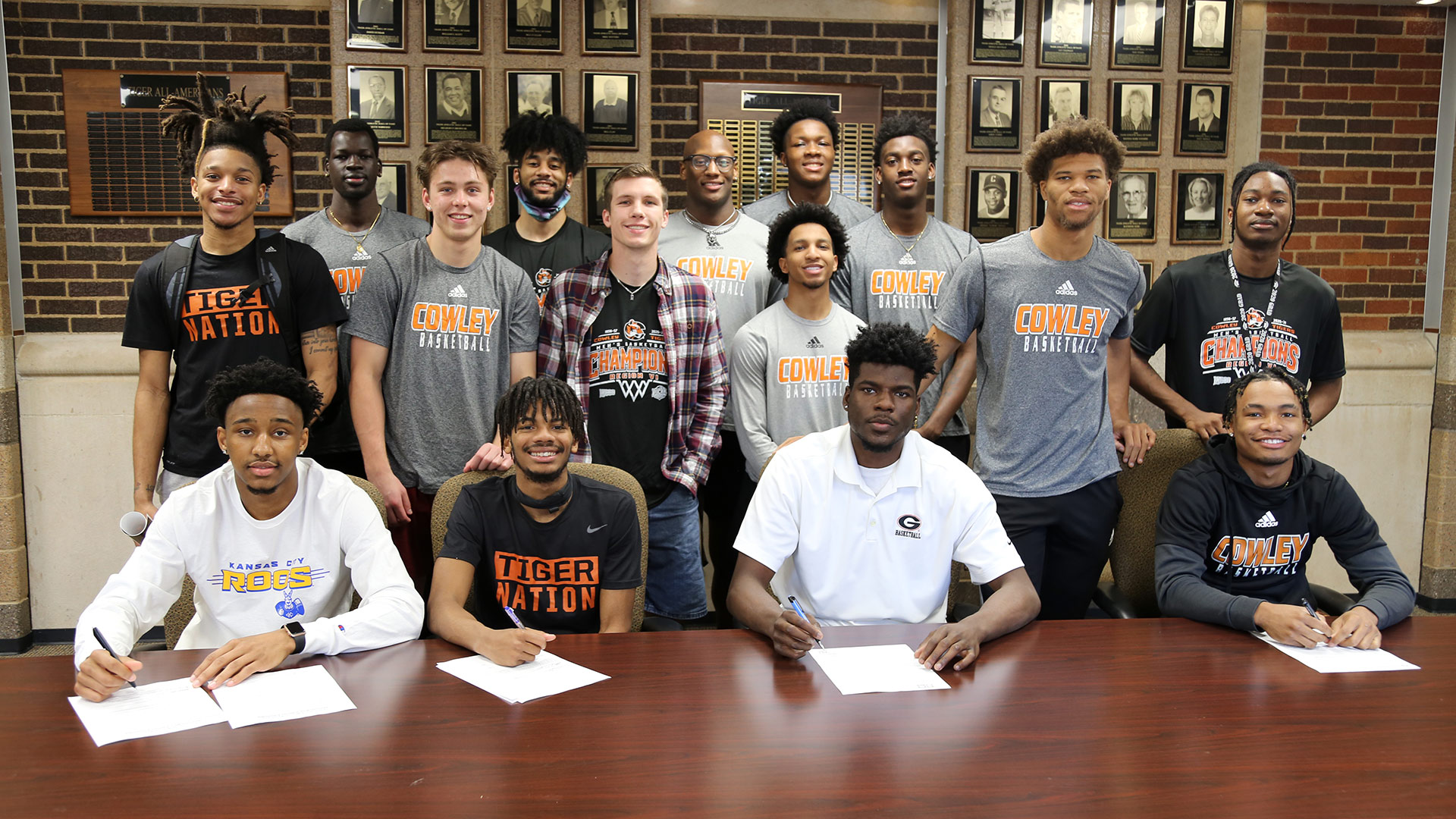 Tiger basketball players sign with four-year schools
