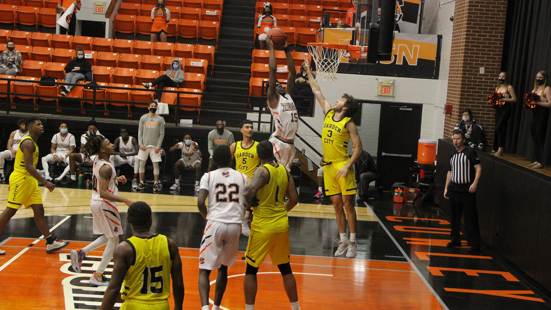 Tigers open conference play with 101-89 win over Garden City