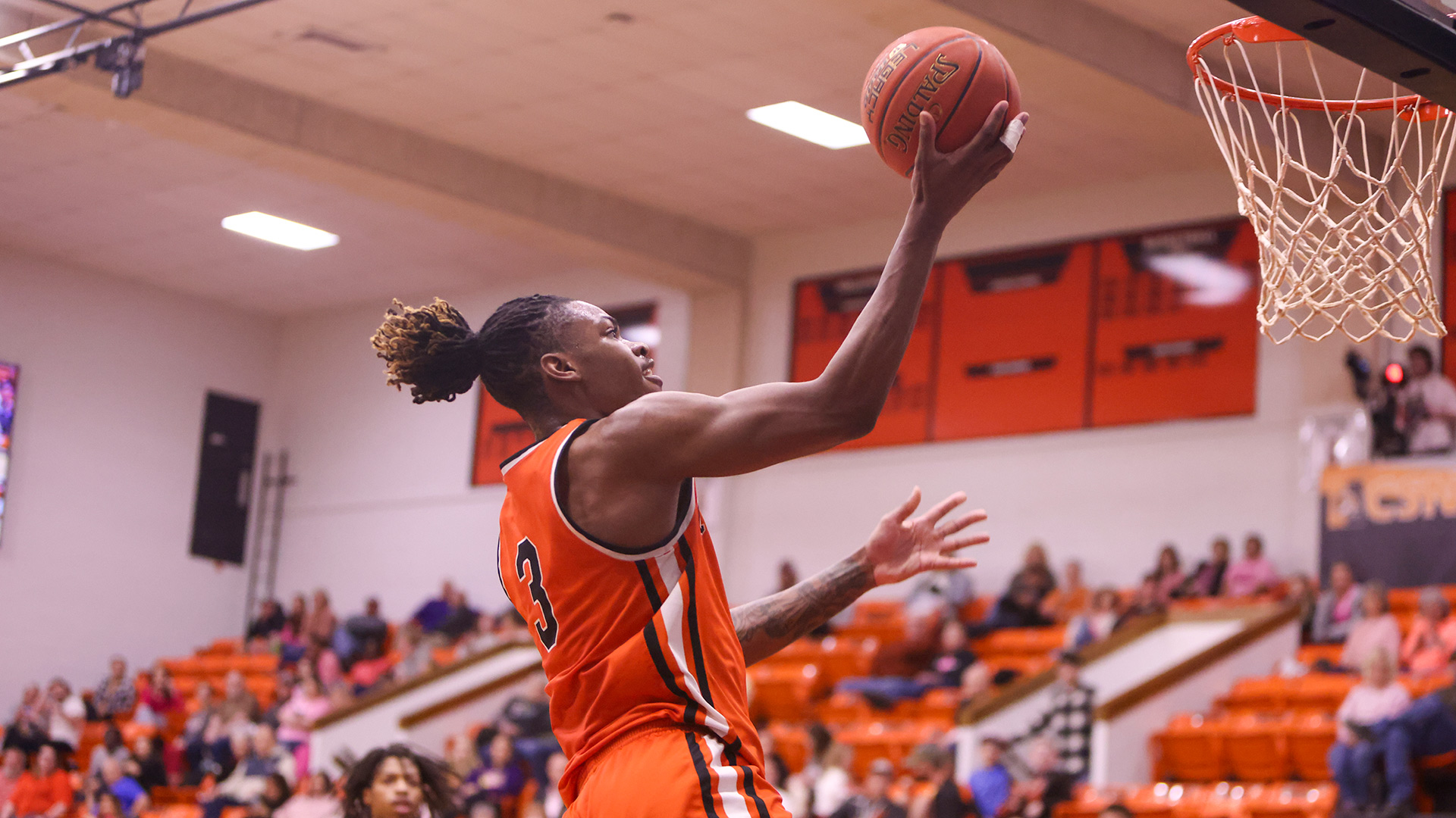 Tigers pull away from pesky Colby squad to earn 91-81 road win