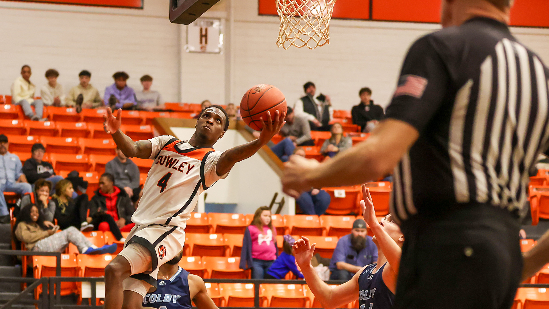 Cowley builds big lead, holds on for 83-78 road win