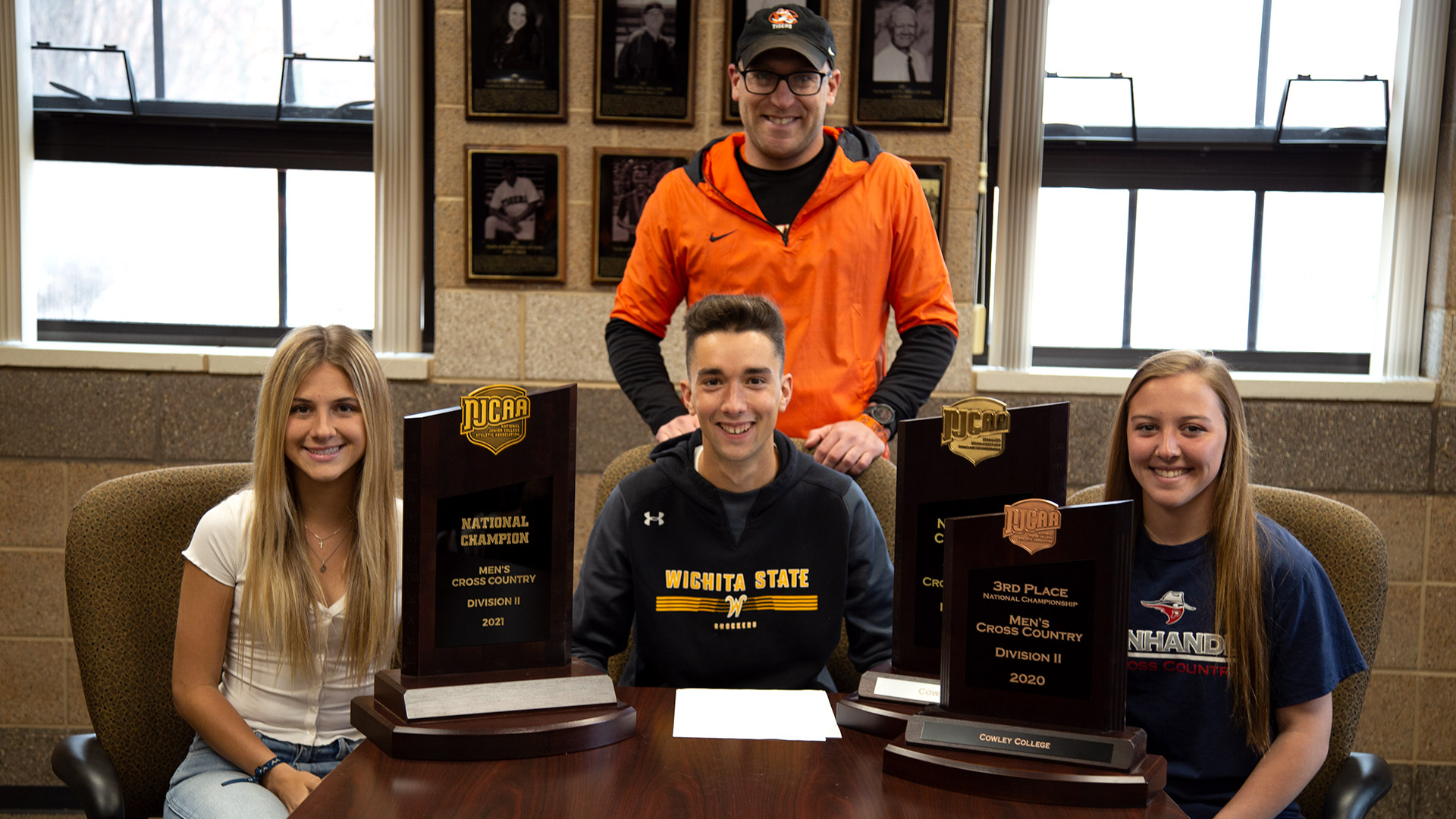 Track athletes sign with four-year schools