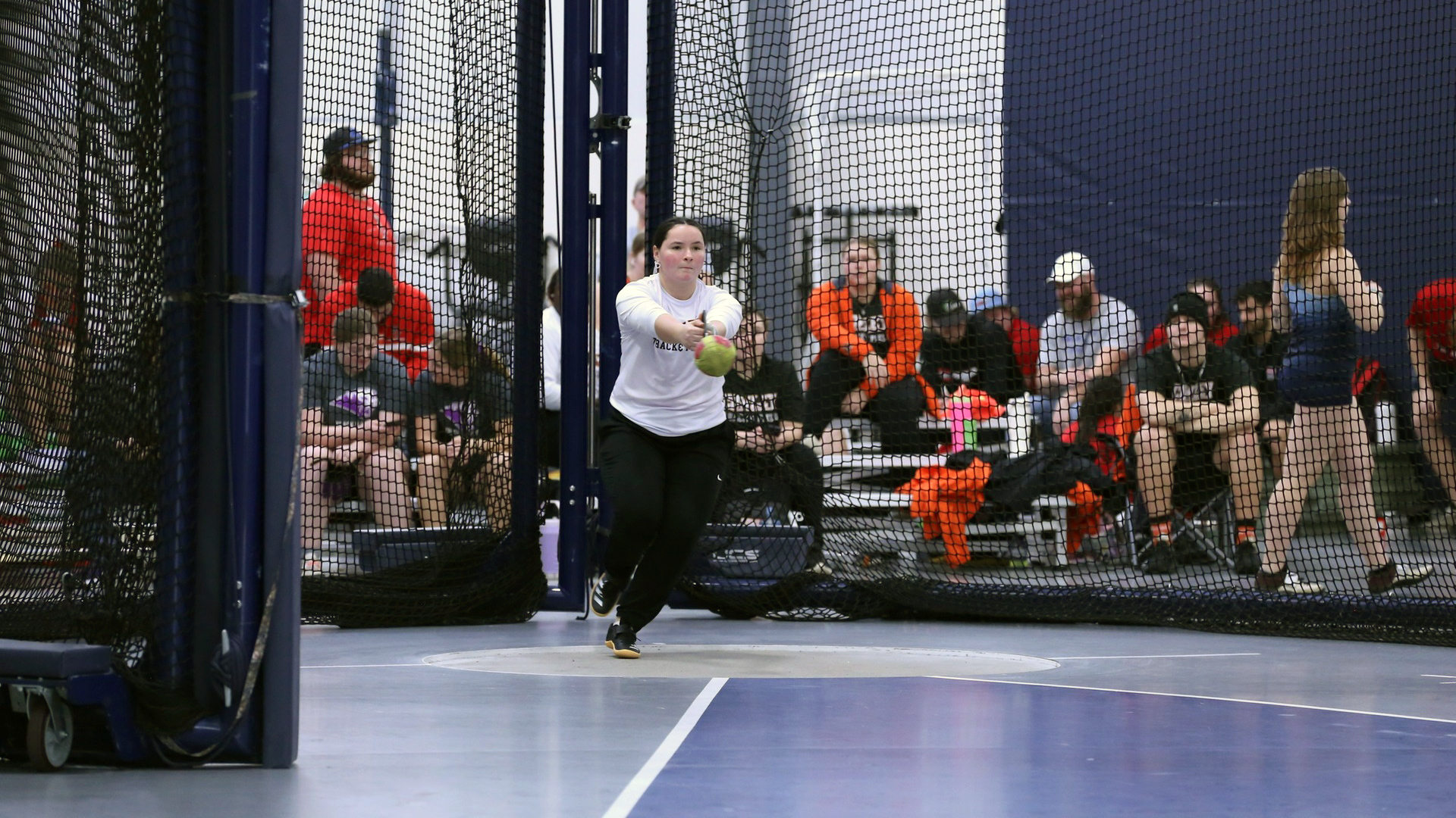 Mercedes Glover throwing during indoor event at WSU