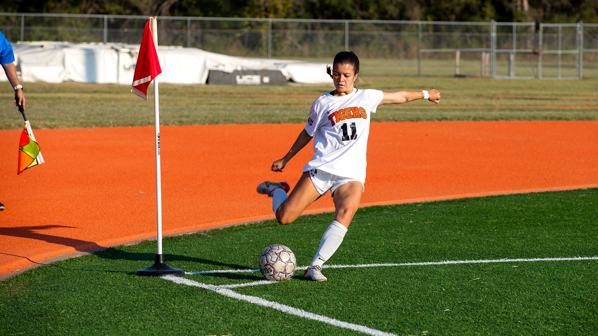 soccer player doing a corner kick