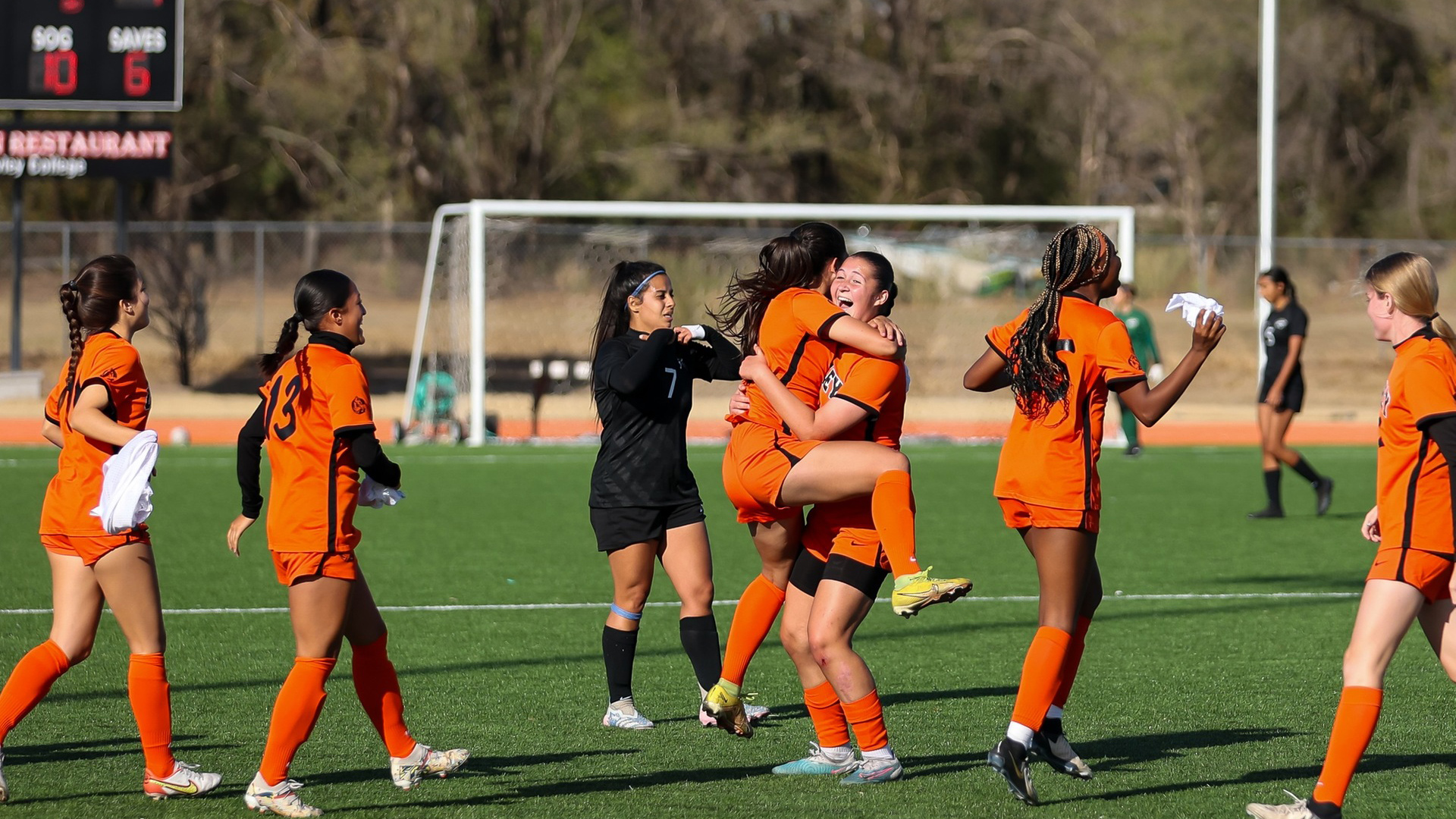 soccer team celebrates win over kansas city